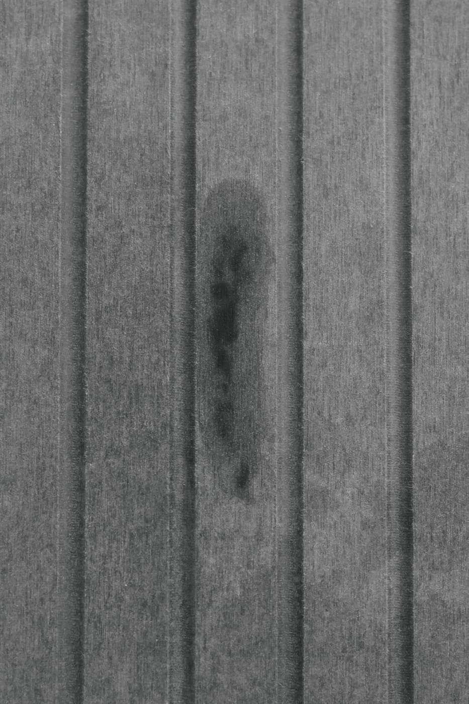 Stone dish drying mat showing visible water absorption mark drying within minutes